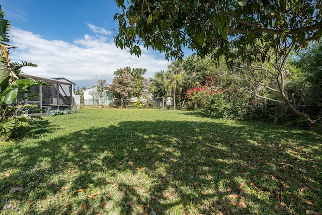 306 Fernandina St, Fort Pierce, FL 34949 - view of yard featuring glass enclosure