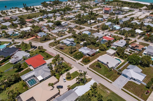 306 Fernandina St, Fort Pierce, FL 34949 - aerial view of property and surrounding area featuring a large body of water and nearby suburban area