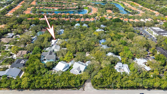 bird's eye view with a residential view and a water view