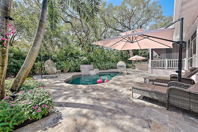 view of patio featuring a fenced backyard and an outdoor pool