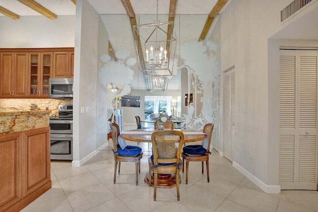 dining room featuring a towering ceiling, beam ceiling, visible vents, and a notable chandelier