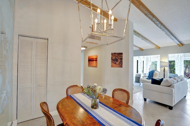 dining space featuring beamed ceiling, a textured ceiling, high vaulted ceiling, a notable chandelier, and light tile patterned flooring