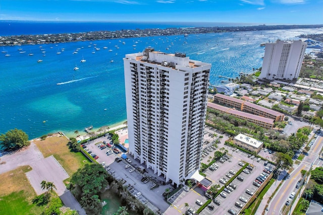 aerial view featuring a water view and a city view