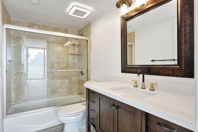 5600 N Flagler Dr Unit 1605, West Palm Beach, FL 33407 - full bath with toilet, enclosed tub / shower combo, and vanity