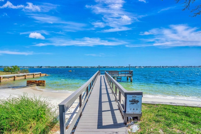 5600 N Flagler Dr Unit 1605, West Palm Beach, FL 33407 - view of dock featuring a water view and a beach view