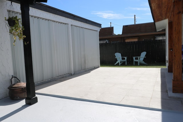 view of patio with fence