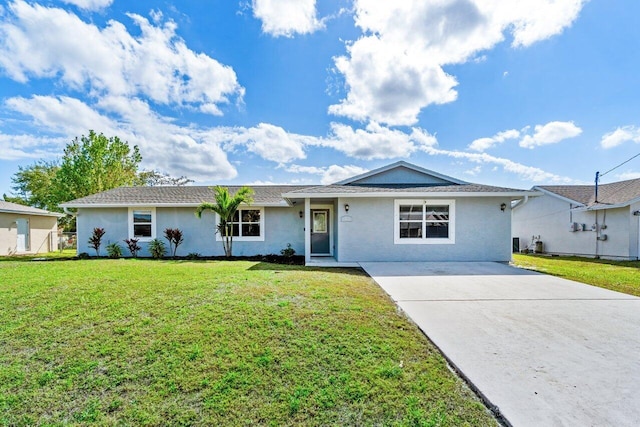 ranch-style home with a front lawn