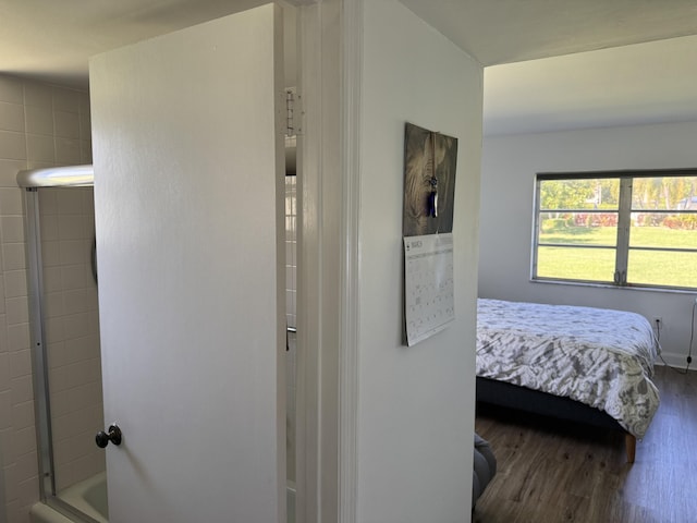 bedroom featuring wood finished floors