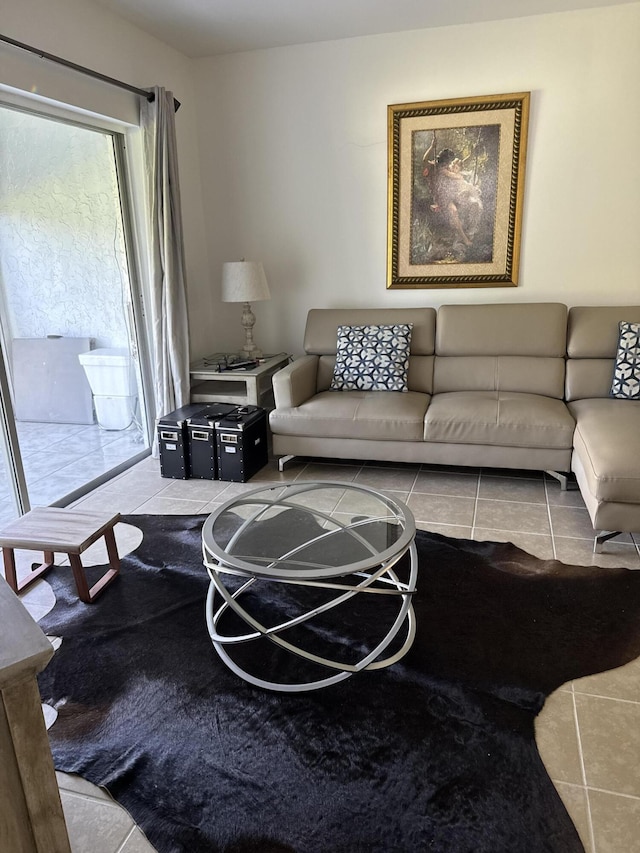 living room with tile patterned floors