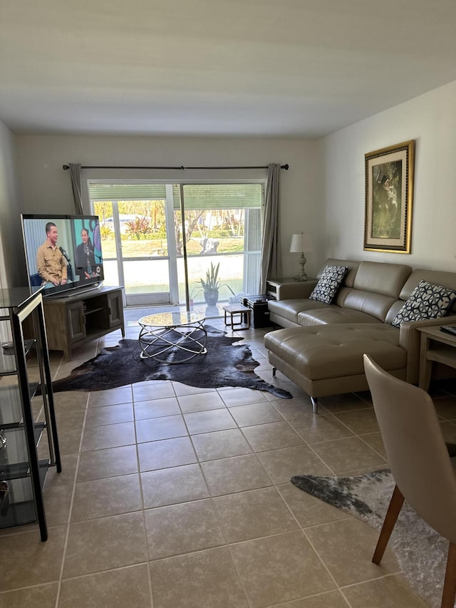 living room with tile patterned flooring