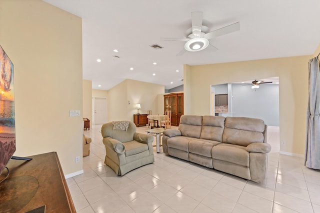 living area featuring visible vents, recessed lighting, baseboards, light tile patterned floors, and lofted ceiling