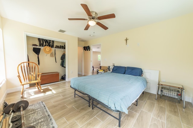 bedroom with a closet and ceiling fan