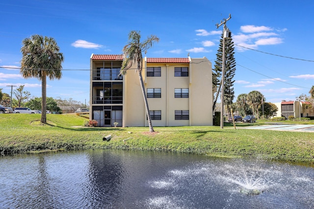 2050 Oleander Blvd Unit 1106, Fort Pierce, FL 34950 - view of building exterior with a water view