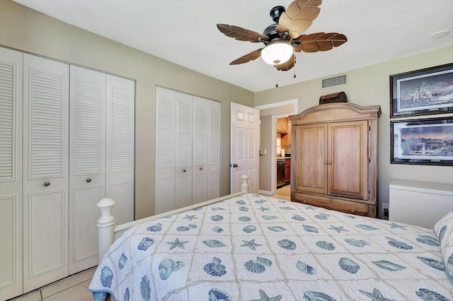 2050 Oleander Blvd Unit 1106, Fort Pierce, FL 34950 - bedroom with multiple closets and ceiling fan