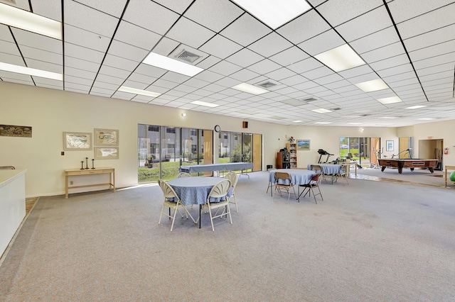 2050 Oleander Blvd Unit 1106, Fort Pierce, FL 34950 - carpeted dining area with a drop ceiling