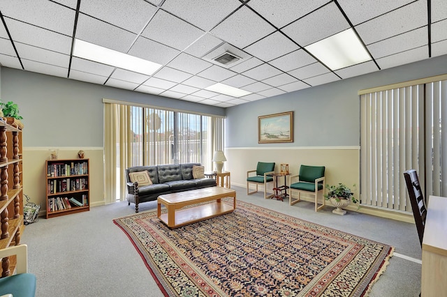 2050 Oleander Blvd Unit 1106, Fort Pierce, FL 34950 - living room featuring carpet floors and a paneled ceiling