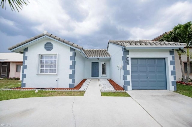 view of front of house with a garage