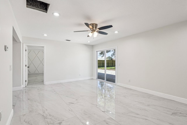 spare room with ceiling fan