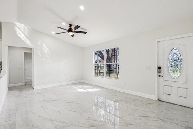 entrance foyer with ceiling fan