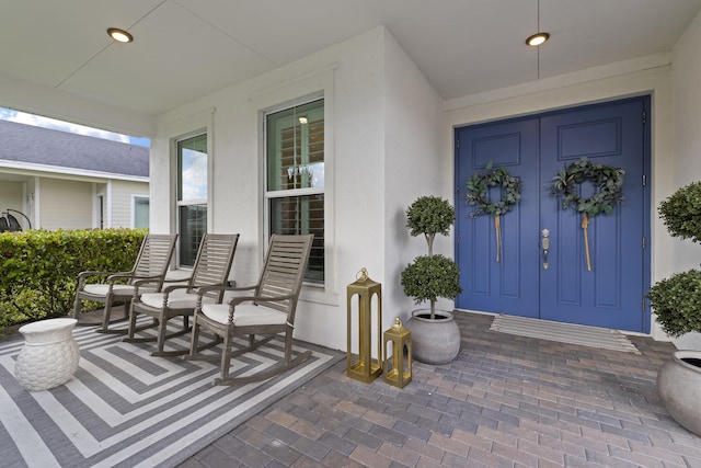 entrance to property with a porch