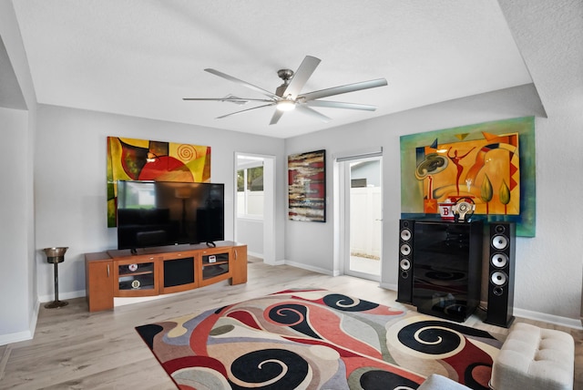 2144 NE 63rd St, Fort Lauderdale, FL 33308 - living room with baseboards, light wood-style flooring, and a ceiling fan