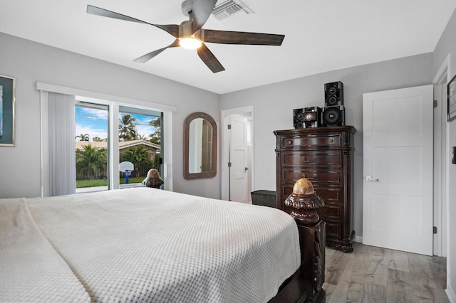 2144 NE 63rd St, Fort Lauderdale, FL 33308 - bedroom with access to outside, visible vents, ceiling fan, and light wood-style flooring