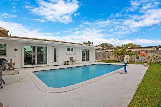 2144 NE 63rd St, Fort Lauderdale, FL 33308 - view of swimming pool featuring a fenced in pool, a fenced backyard, and a patio