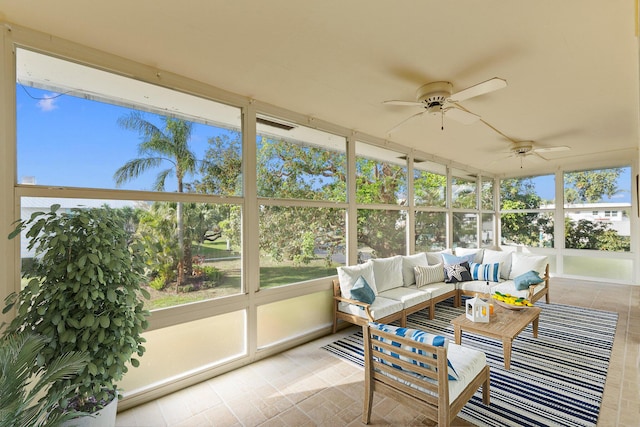 sunroom / solarium with ceiling fan