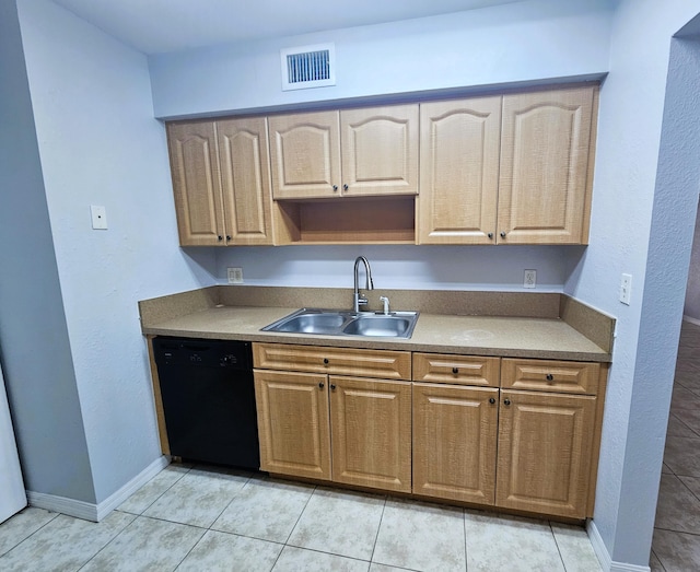 kitchen with a sink, visible vents, baseboards, light countertops, and dishwasher