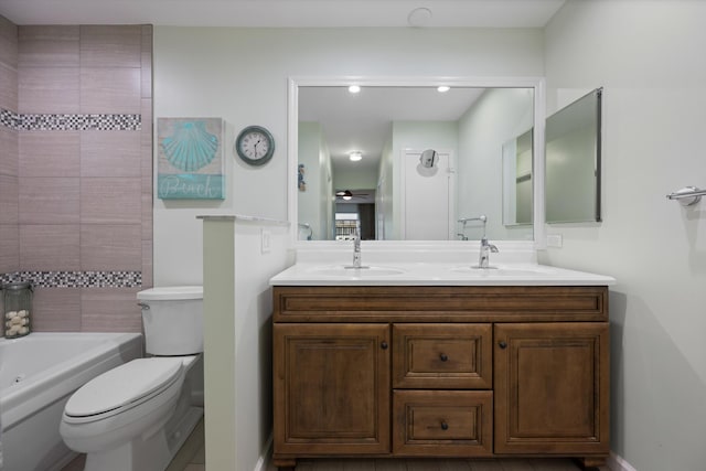 10137 S 42nd Ave S, Boynton Beach, FL 33436 - bathroom featuring double vanity, toilet, baseboards, and a sink