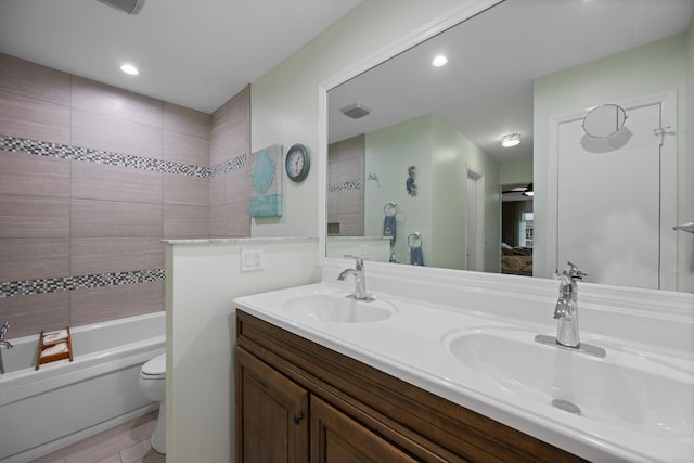 10137 S 42nd Ave S, Boynton Beach, FL 33436 - bathroom with connected bathroom, toilet, a sink, and double vanity