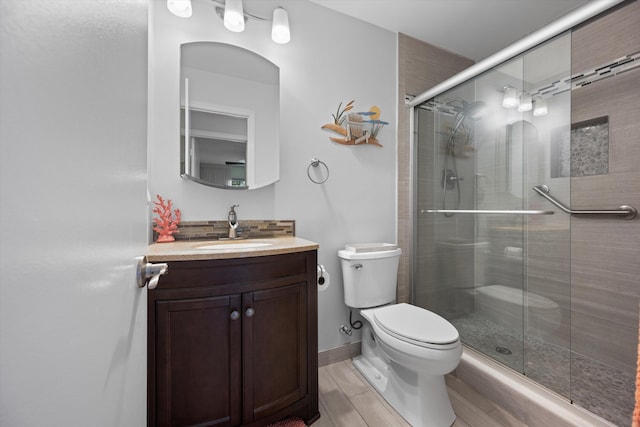 10137 S 42nd Ave S, Boynton Beach, FL 33436 - bathroom with toilet, vanity, and a stall shower