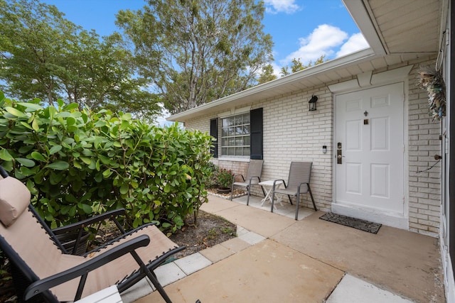 10137 S 42nd Ave S, Boynton Beach, FL 33436 - property entrance featuring brick siding