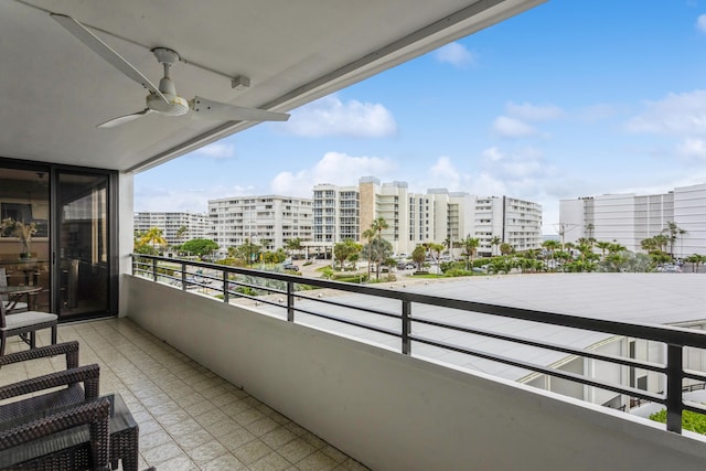 balcony featuring ceiling fan