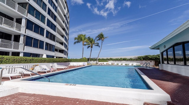 view of swimming pool featuring a patio