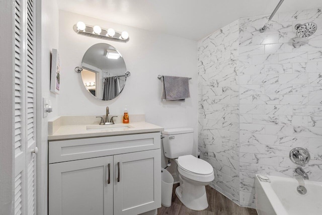 bathroom with toilet, shower / bath combo, wood finished floors, and vanity