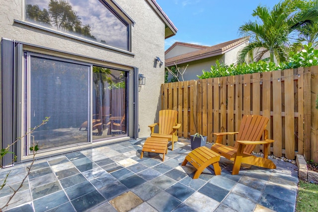 view of patio with fence