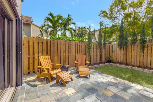 view of patio with a fenced backyard