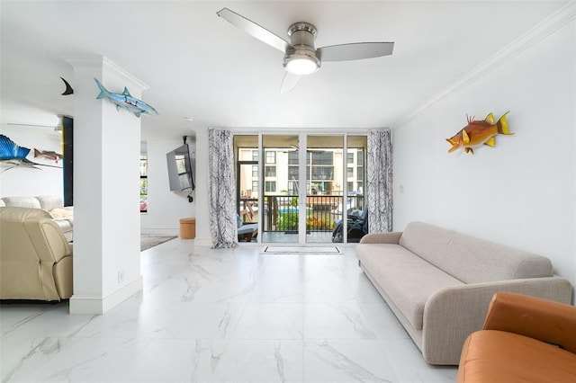 living area with a ceiling fan, marble finish floor, crown molding, and baseboards