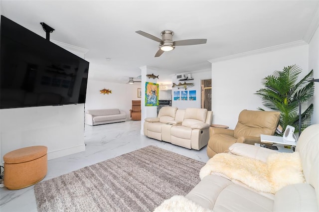 living area with marble finish floor, ornamental molding, and a ceiling fan