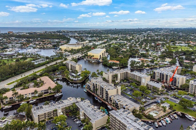 aerial view featuring a water view and a city view