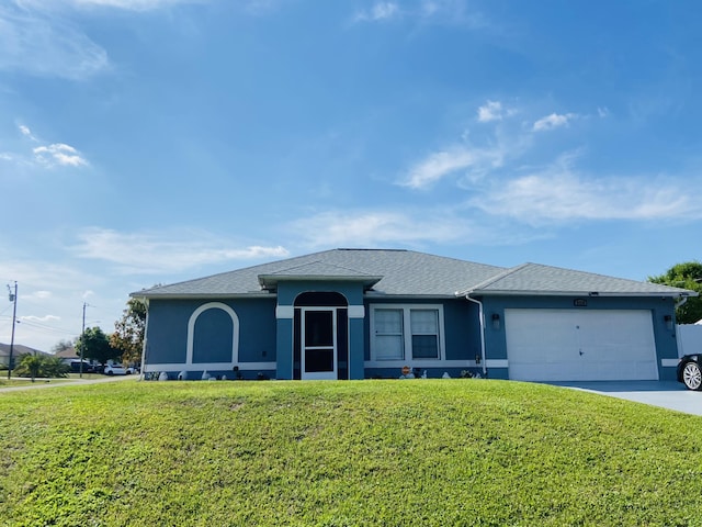 ranch-style home with a front yard, an attached garage, and stucco siding