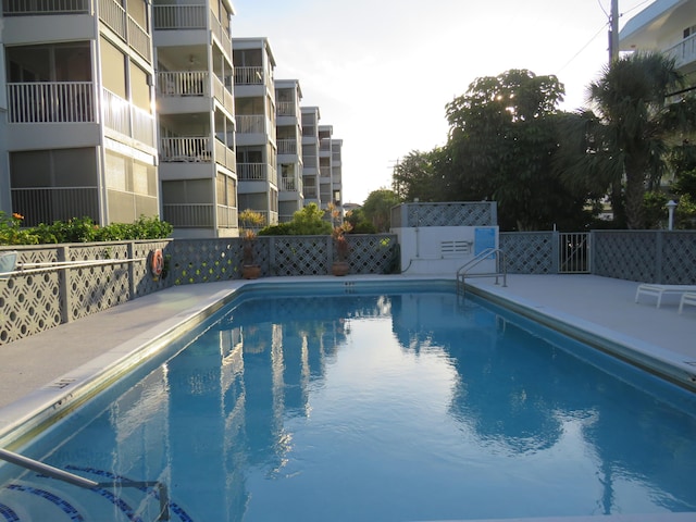 community pool with fence