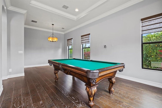 recreation room featuring baseboards, visible vents, hardwood / wood-style floors, and ornamental molding