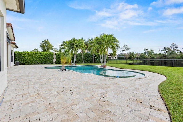 view of pool featuring a lawn, a patio area, fence, and a fenced in pool