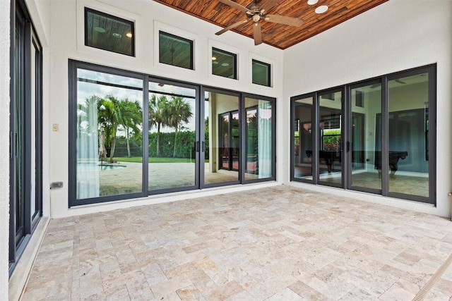 view of patio featuring ceiling fan