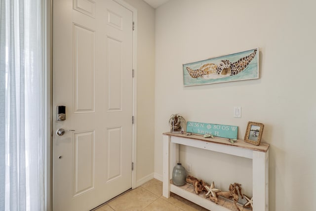 view of tiled foyer entrance