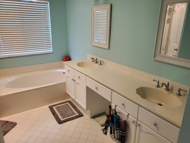 bathroom with vanity and a tub to relax in