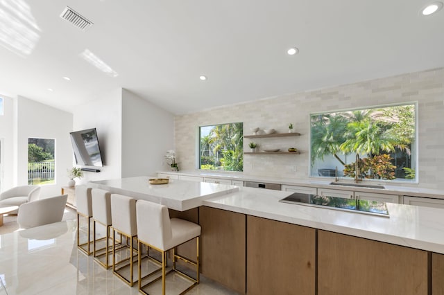 kitchen with backsplash, visible vents, open shelves, and black electric cooktop