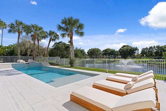 view of pool featuring a water view, a patio area, a fenced backyard, and a fenced in pool